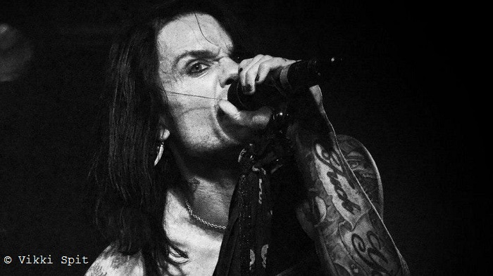 Photo of Zion performing at a rock concert.
